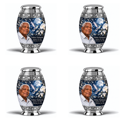 4 Keepsake 3 inch Urns, Monar memorial urn with silver-blue hummingbird and starlit moonflowers, Tobias Fairhaven portrait, January 16, 1945 to February 16, 2021.