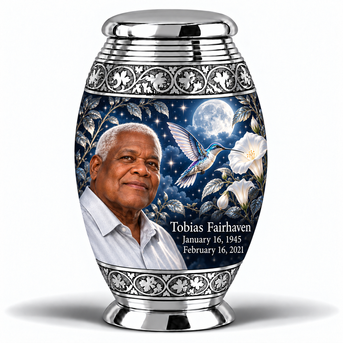 1 Keepsake 3 inch Urn, Monar memorial urn with silver-blue hummingbird and starlit moonflowers, Tobias Fairhaven portrait, January 16, 1945 to February 16, 2021.