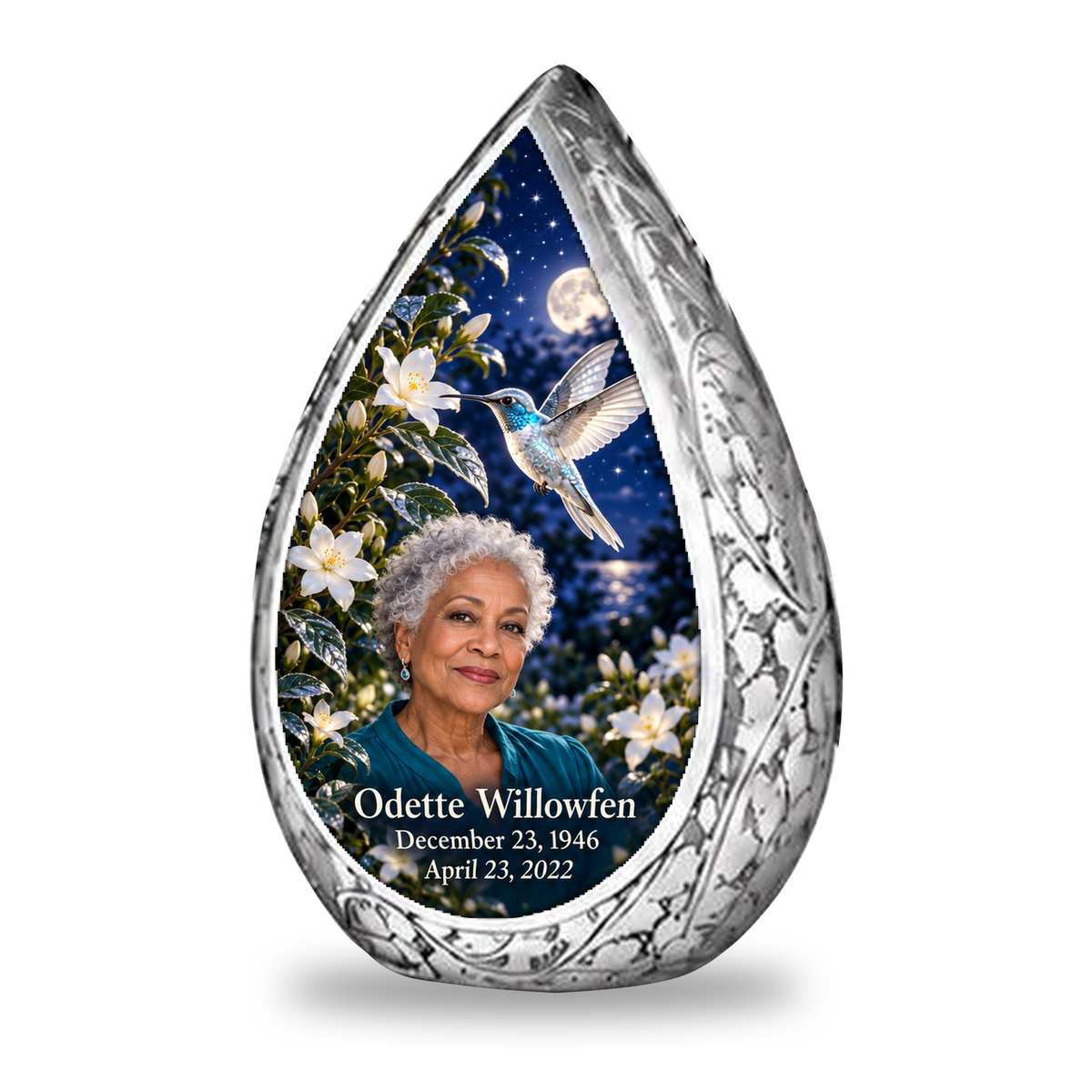 1 Keepsake 3 inch Urn Straight Drop memorial urn, starlit silver hummingbird and jasmine, Odette Willowfen portrait and full memorial dates, white background.