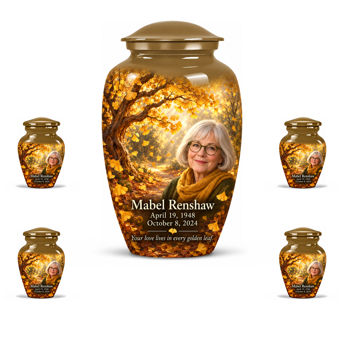 One 10-inch large urn with four matching 3-inch keepsakes, Classic golden-ginkgo fan-leaf design with fictional Mabel Renshaw portrait, name and full memorial dates on white background.