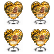 Tree of Life 20 set of four identical Heart keepsakes in two rows, each showing gold ginkgo leaves, fictional Darius Pell portrait and full dates on complete silver ring stands.