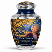 One 10-inch large urn, Tasty golden-ginkgo fan-leaf design with fictional Etta Corwin portrait, name and full memorial dates on white background.